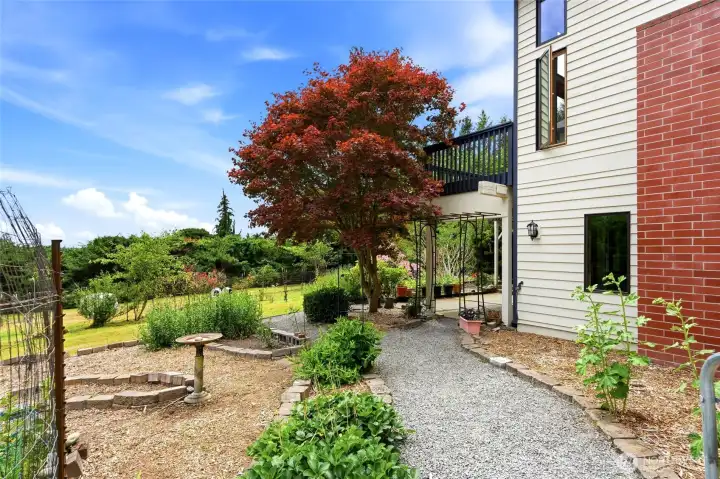 Pathway to the back of the home and garden spaces. Pathway to the back of the home and garden spaces.