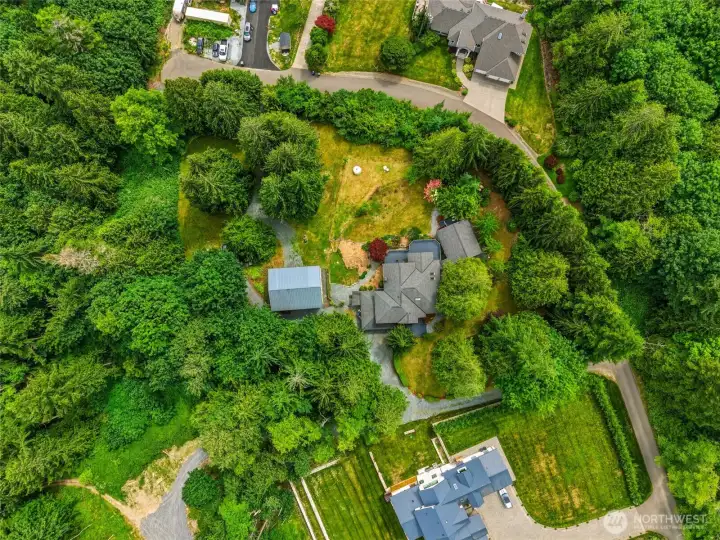 Arial view of the home and shop. Arial view of the home and shop.