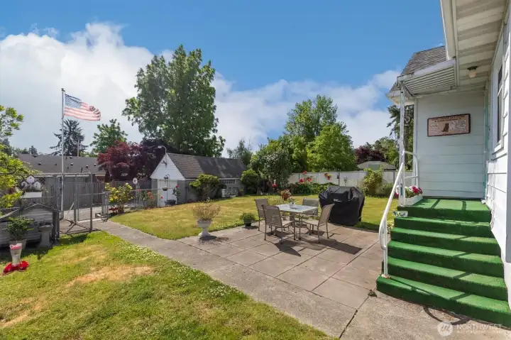 Spacious backyard with patio area