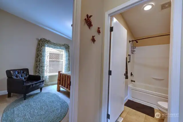 From greatroom get a peek a boo look into the den with full bathroom to service that side of the home.