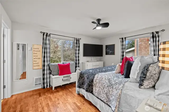 Primary retreat with full bath ensuite and walk in closet.
