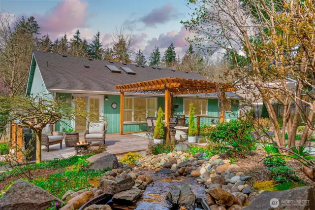 The beckoning backyard is even more beautiful than the front!