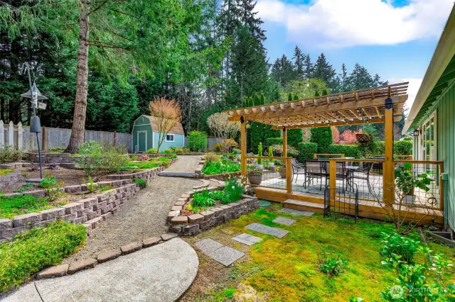 Meandering paths and terraced gardens provide low maintenance beauty