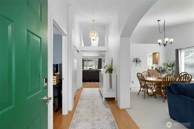 Enter to find a dramatic entry with soaring ceilings & architectral design