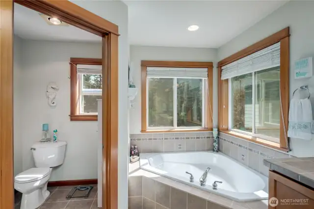 Primary bathroom with corner soaking tub