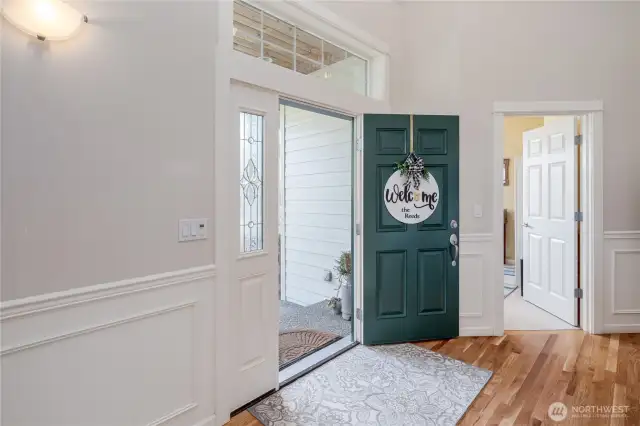 Foyer with hardwood floors
