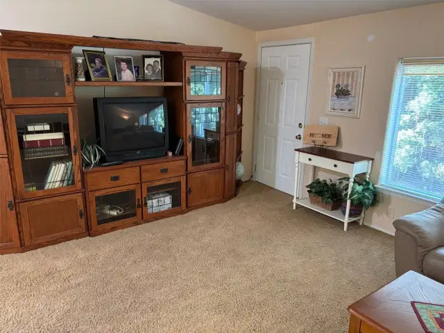 Family room with TV cabinet.