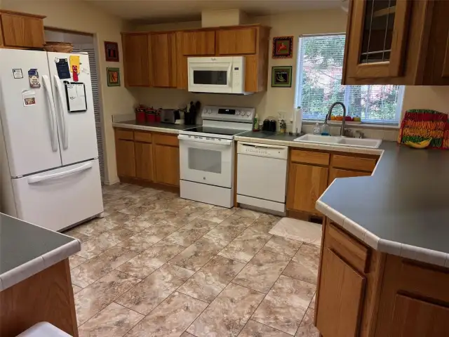 Kitchen with new stove/oven.