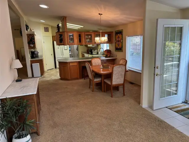 View from living room the dining room and kitchen.