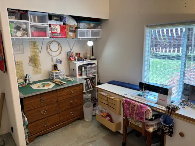 Another view of guest bedroom with dresser.