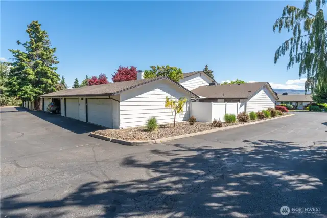 End unit with alley access to garage