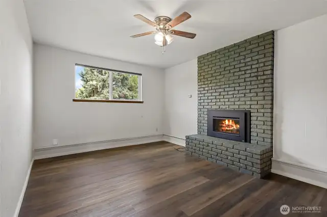 Downstairs family room with fireplace