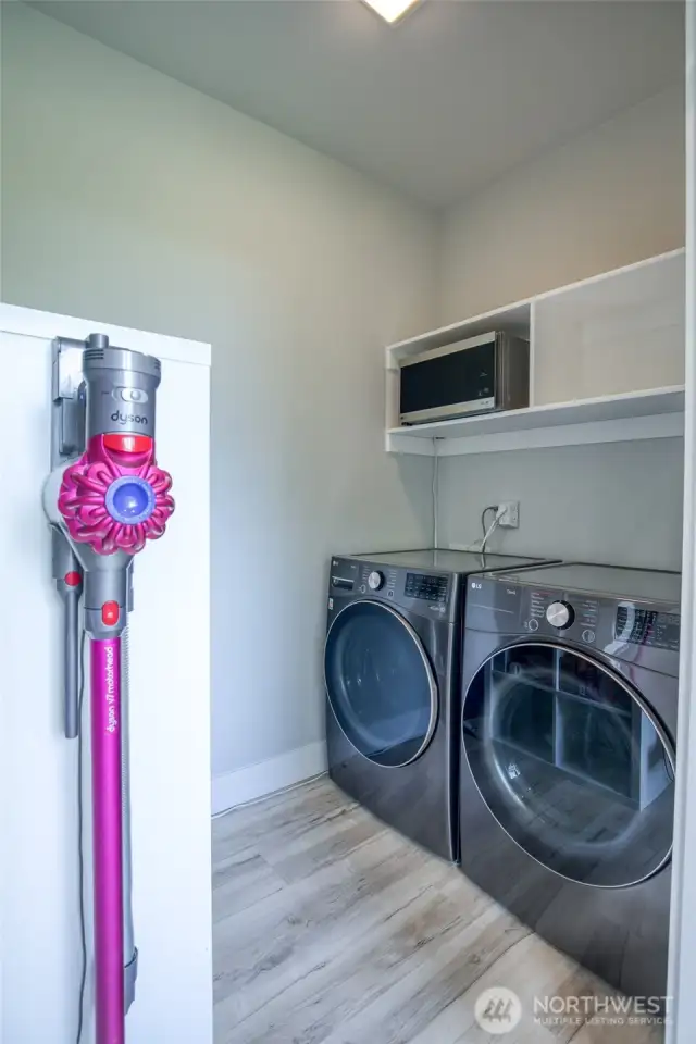 Utility room with shelving and plenty of room for storage