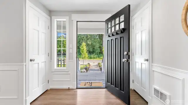 Inviting front door with two spacious closets!