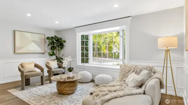 Living room with a built in bench.