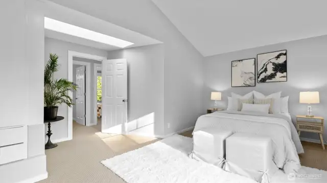 Primary with vaulted ceilings and skylight