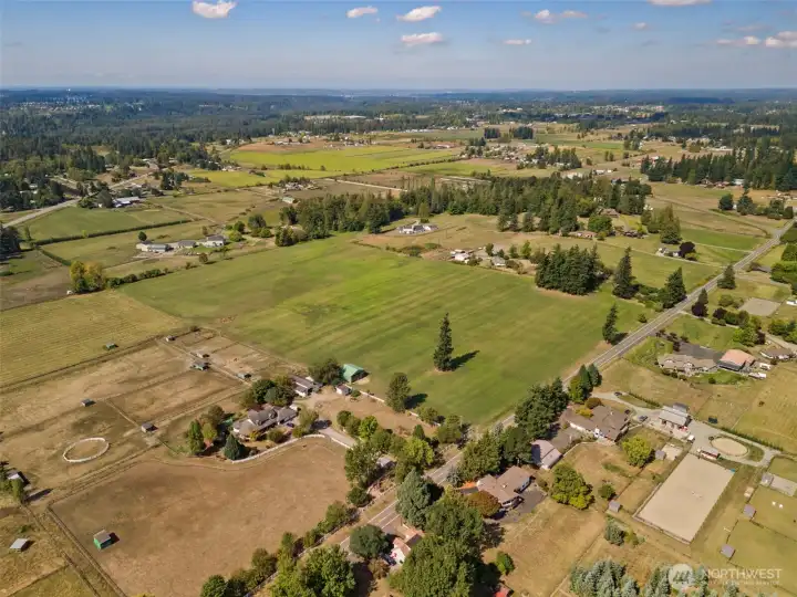 View from Southeast.  This parcel is surrounded by quality residential acreage homes.