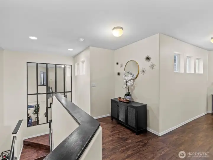 Once upstairs, the thoughtfully designed hallways have space for furniture, creating a cozy feeling.