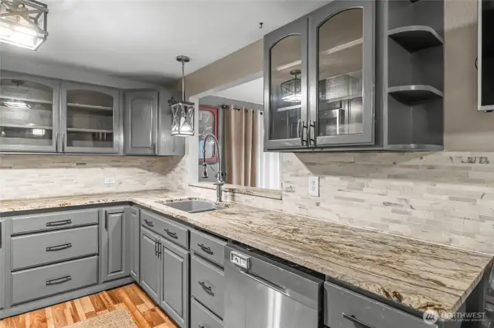 MAIN FLOOR | Another angle of the kitchen with the pass-through to the dining room.