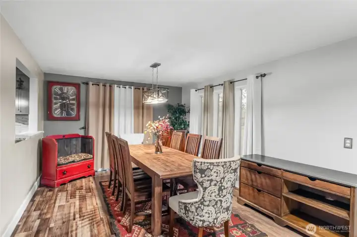 MAIN FLOOR | Another view of the beautiful dining room. And, lucky you, the table and chairs are included in the sale of the home.