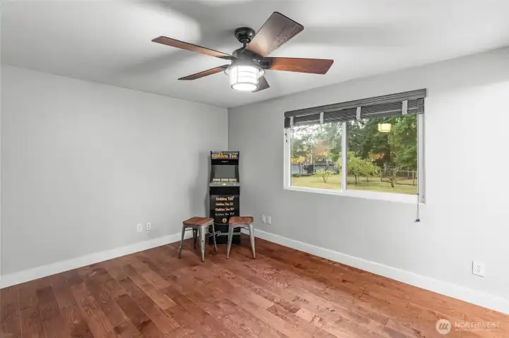 UPPER LEVEL | The primary bedroom is located on the upper level at the end of the hall on the right and overlooks the backyard.