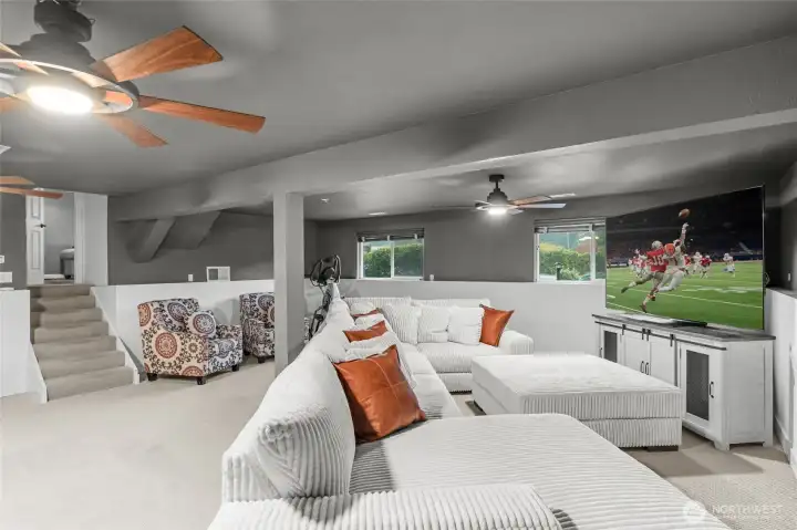 LOWER LEVEL | This is the biggest sectional I've ever seen! And it fits so well in this room with plenty of space to spare for other purposes.