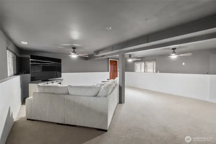 LOWER LEVEL REC ROOM | It's huge! There's plenty of space for exercise equipment, a sitting area, a craft area...limited only by your imagination.