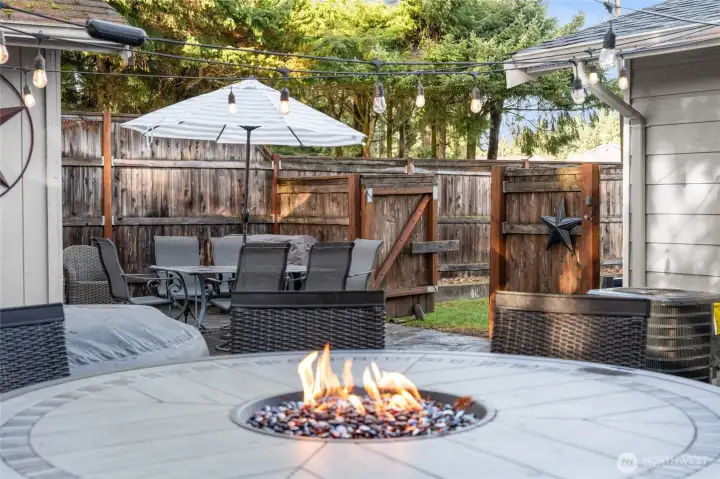 BACKYARD | Looking back towards the gates that lead to the side yard and driveway.