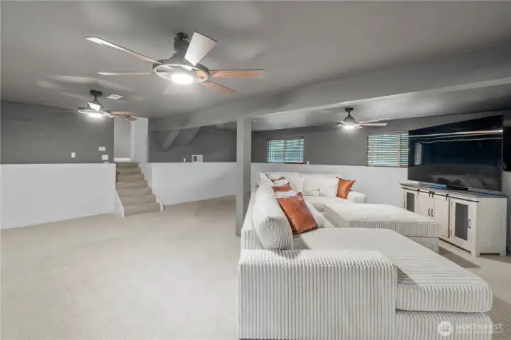 LOWER LEVEL REC ROOM | It's huge! There's plenty of space for exercise equipment, a sitting area, a craft area...limited only by your imagination.