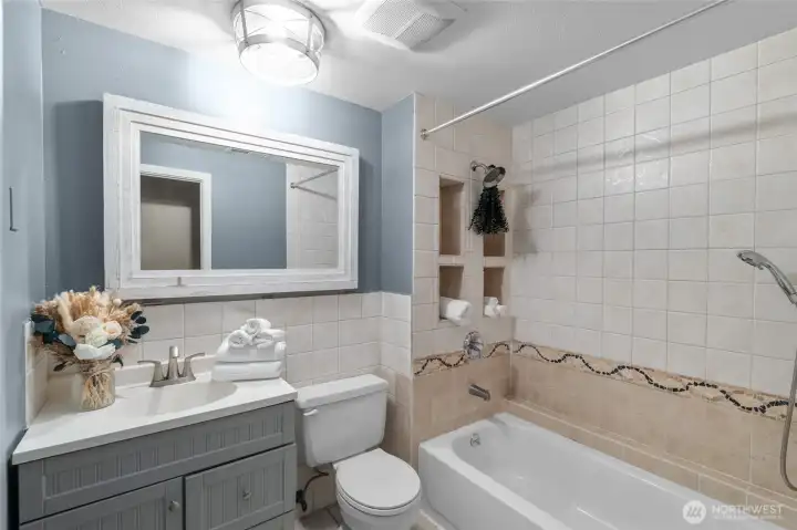 HALLWAY BATHROOM | Another view of the bathroom located at the top of the stairs to the right.