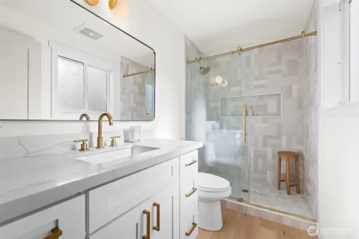 Primary en-suite bath on main floor