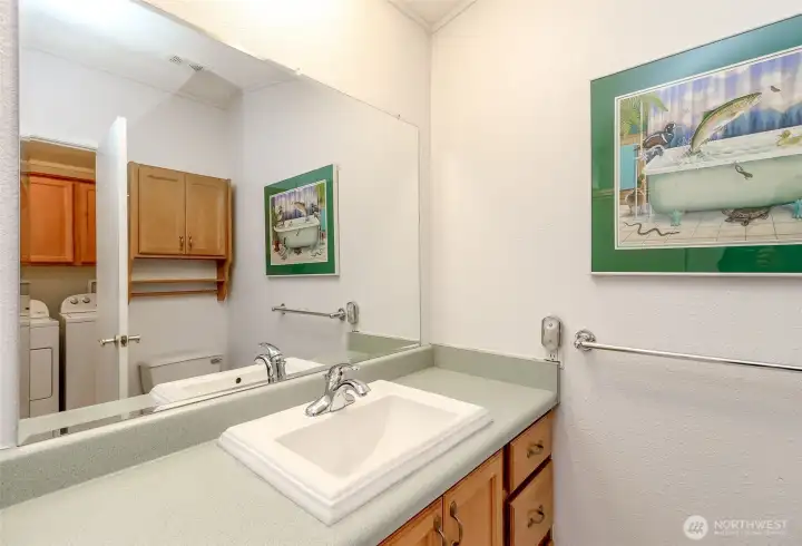 Full bath with spacious primary.