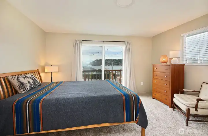 The primary bedroom also has westerly views and