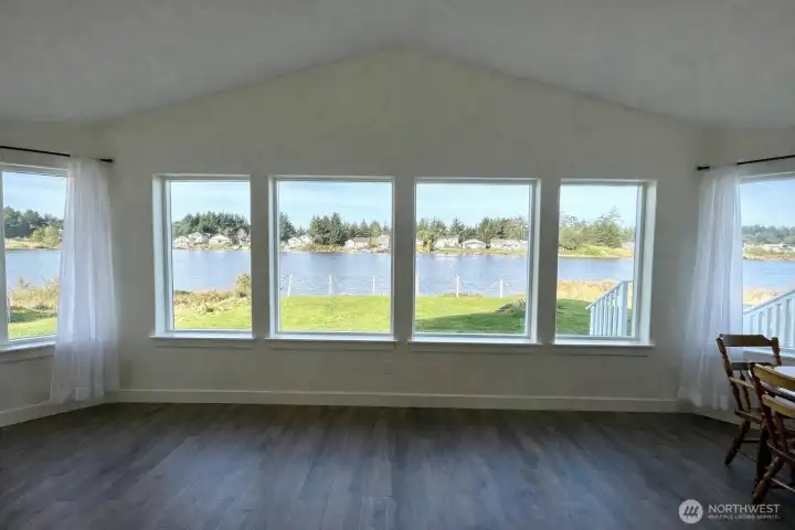 Wall of windows capturing lake views