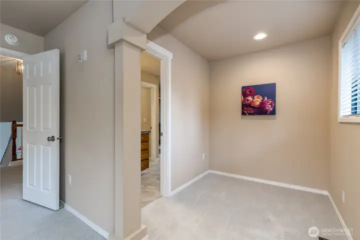 Primary suite includes this cozy reading nook outside the ensuite