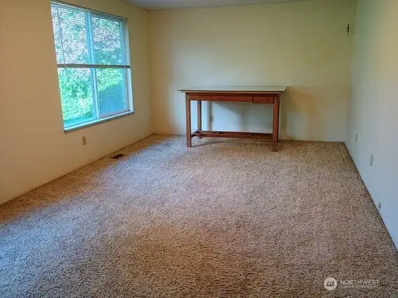 Far end of the guest room/office on the front side of the house.