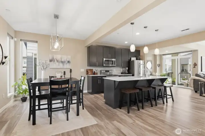 open concept main level is light, bright & inviting, with abundant space for effortless day-to-day flow or hosting friend groups of any size.