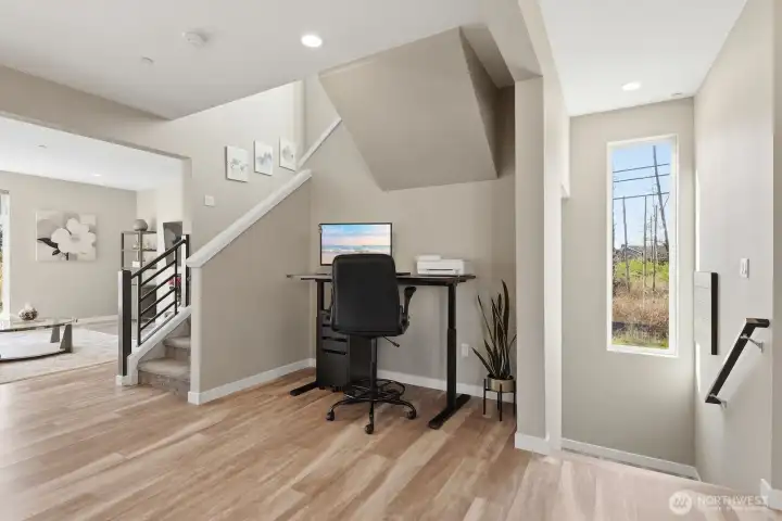 Use this nook as a WFH space, a seating area, or a plant corner.