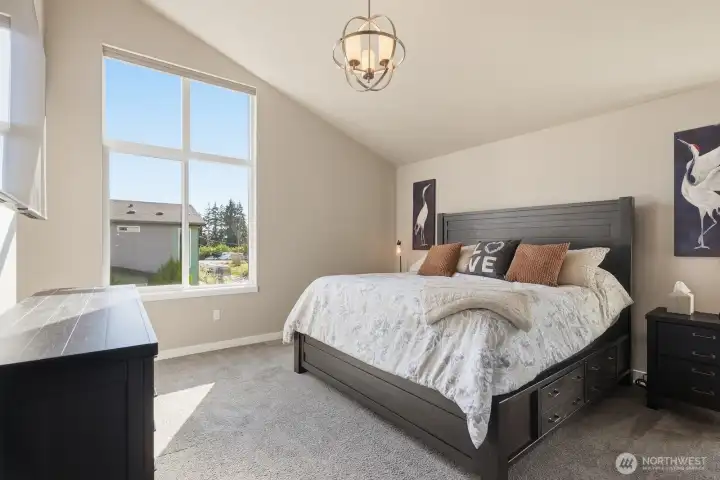 All three bedrooms are upstairs, including this bright and stately primary suite!