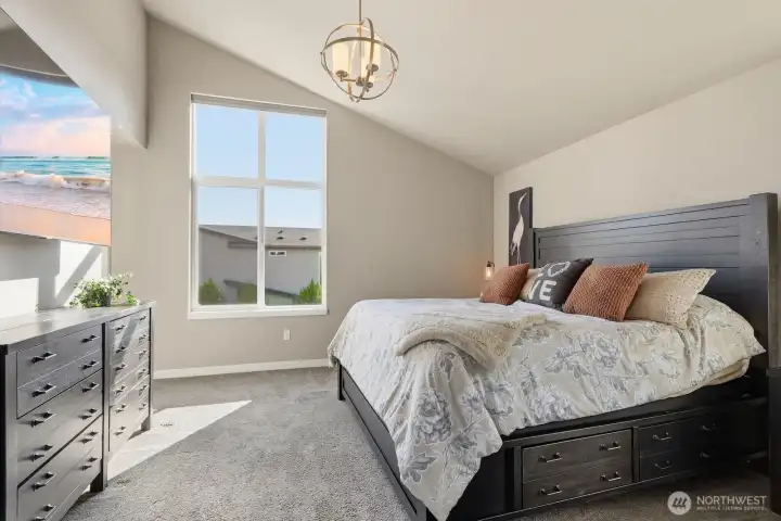 Vaulted ceilings and large windows fill the space with great sunlight.