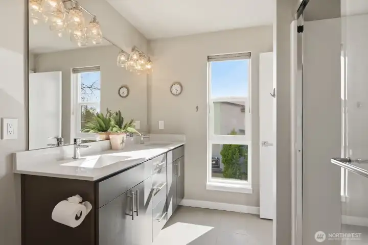 The primary ensuite bath will make getting ready each day feel like a trip to the spa.