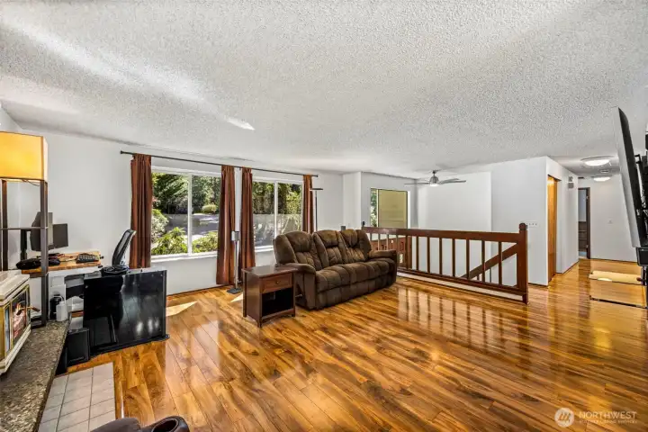 Lovely laminate flooring, large windows.