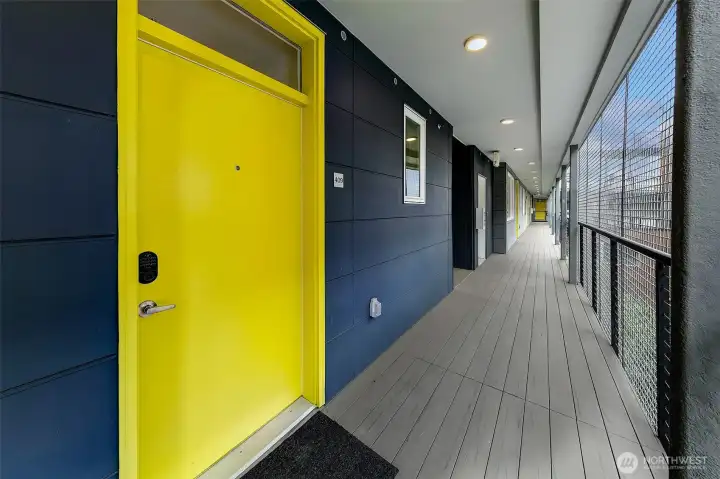 Unit 409 with a covered outdoor walkway.