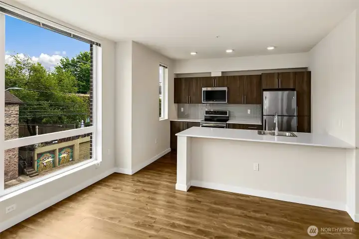 Large windows overlook Seattle's most vibrant and convenient neighborhood.