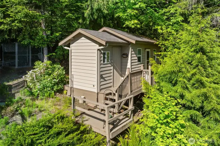 Second “sleeping cabin” includes a 3/4 bath and a bedroom.