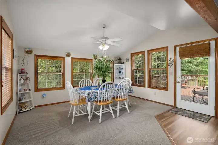 Eat Nook located off kitchen with door to deck.