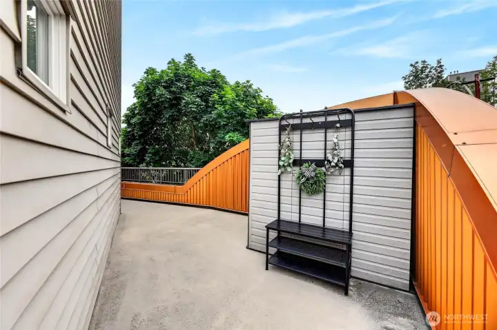 Your own wrap around deck comes with it's own storage shed. Seated coat rack conveys with the sale of the unit. Your own wrap around deck comes with it's own storage shed. Seated coat rack conveys with the sale of the unit.