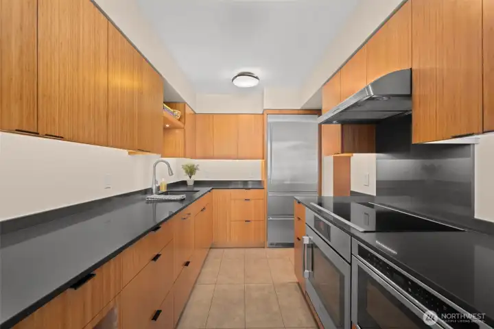 Updated kitchen with soft close drawers, vented hood, and built in microwave.