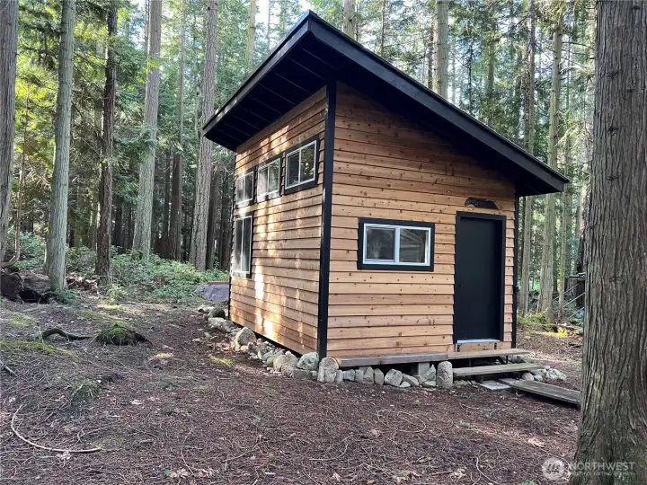 12x16 Cedar sided shed with new windows and door. 12x16 Cedar sided shed with new windows and door.
