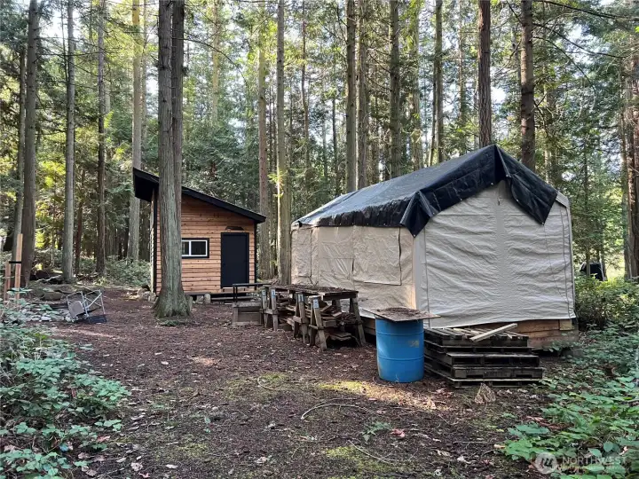 10x20' deck with canvas cover can be opened up for a great workspace or outdoor dining. 10x20' deck with canvas cover can be opened up for a great workspace or outdoor dining.